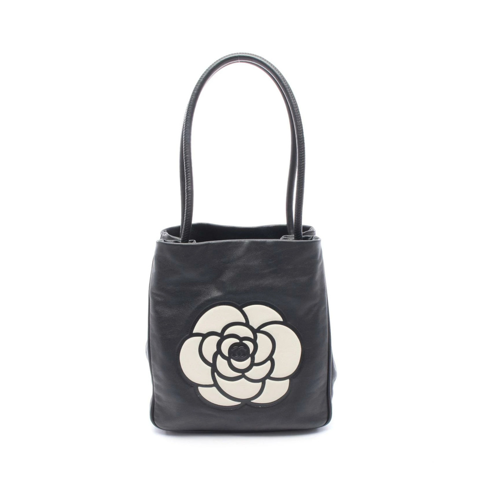 Chanel camellia tote bag lambskin leather black white